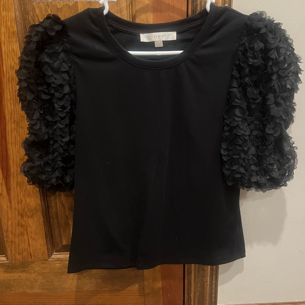 Anthropologie puff sleeve black top size small
